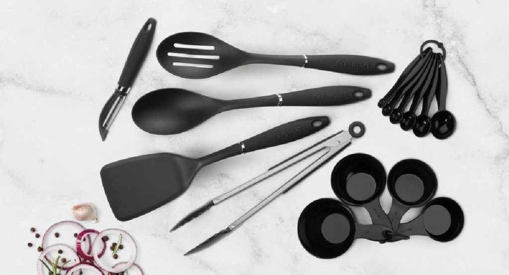 Cuisinart Utensil Set 15 pieces laid out on marble board