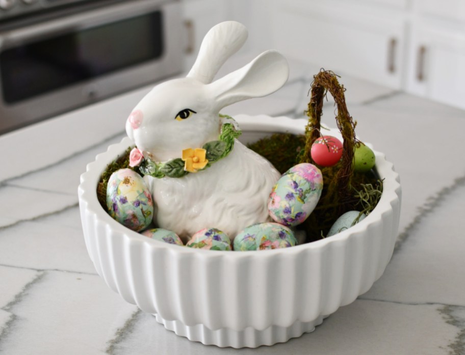 A holiday centerpiece filled with DIY paper Easter Eggs