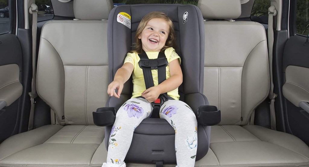 Disney's Convertible Car Seat with little girl in it
