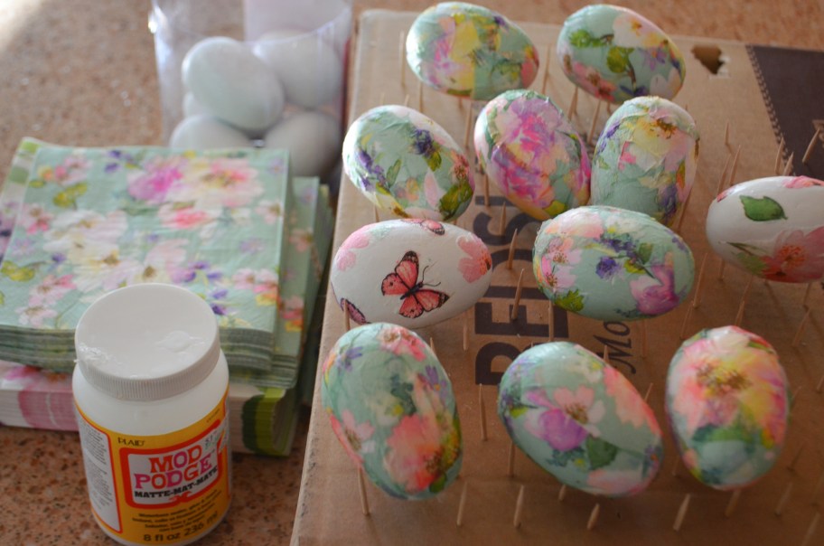 Making DIY Easter decor and drying decoupage easter eggs on toothpicks