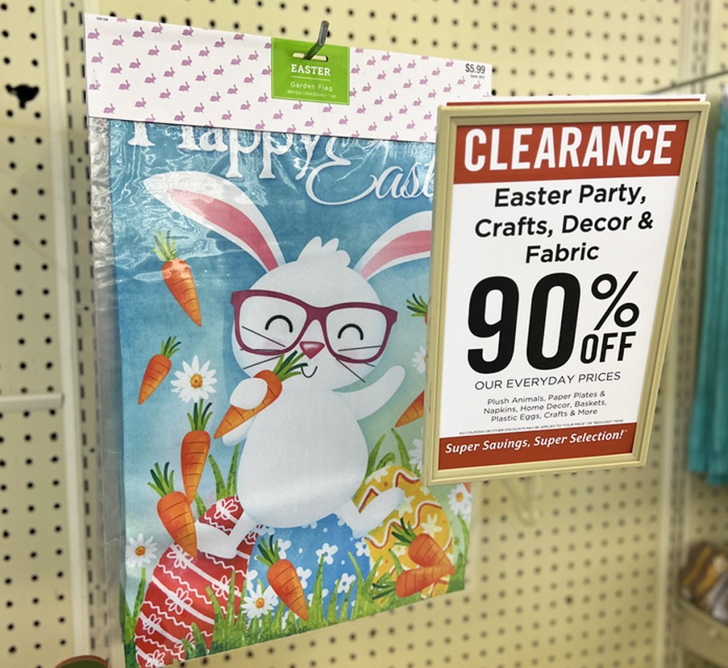 easter garden flag next to 90% off sign