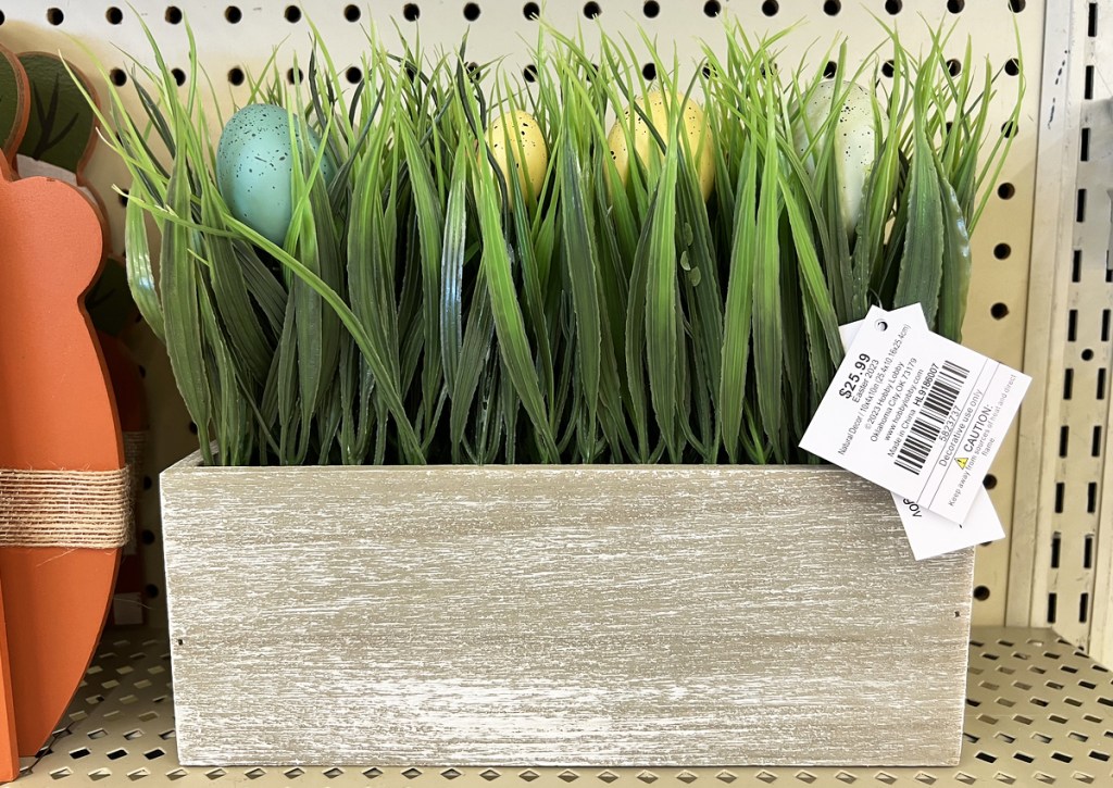 easter grass decor in wood planter