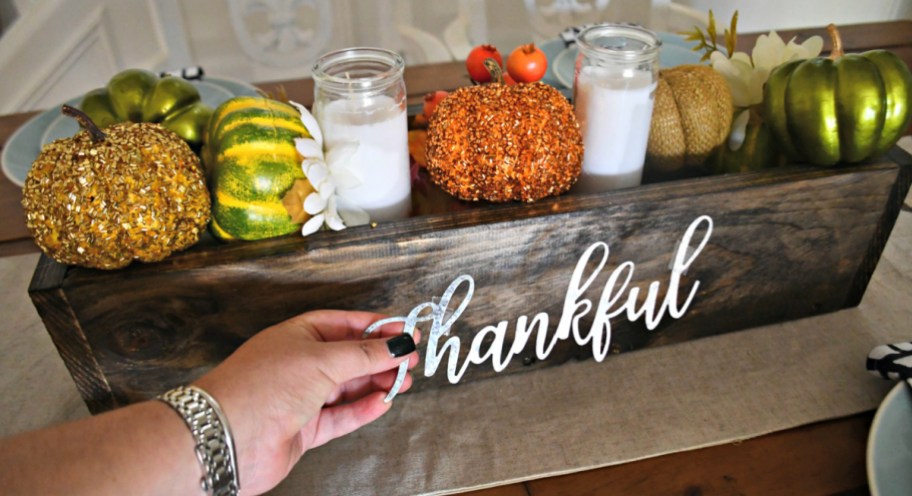 A diy fall centerpiece which is one of our top Dollar Tree wedding decoration ideas