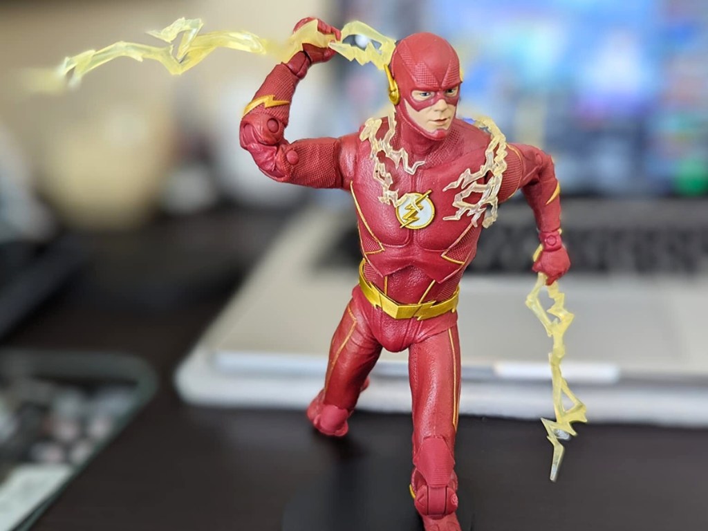Flash figure in front of computer