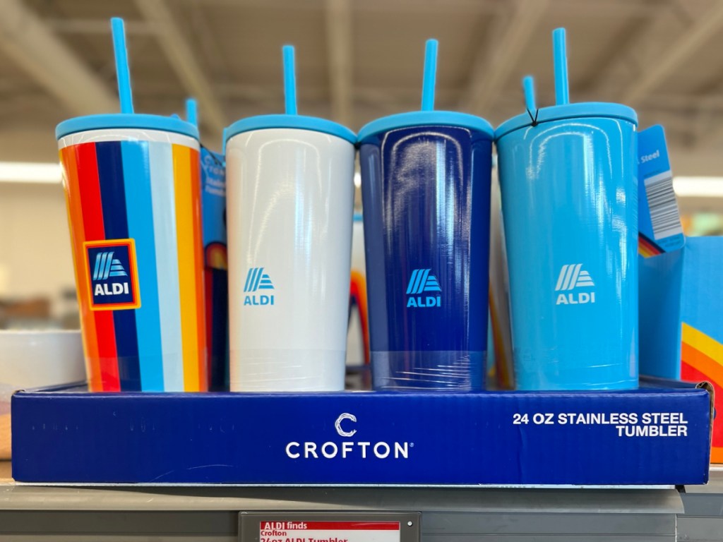 Four colorful Crofton 24oz ALDI Tumblers on display at the store