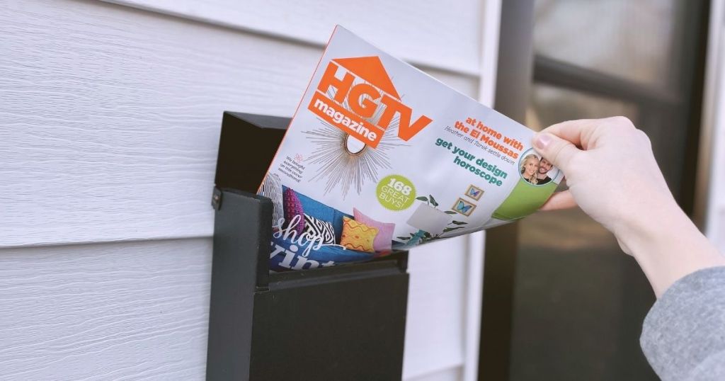 hand grabbing HGTV magazine from mailbox
