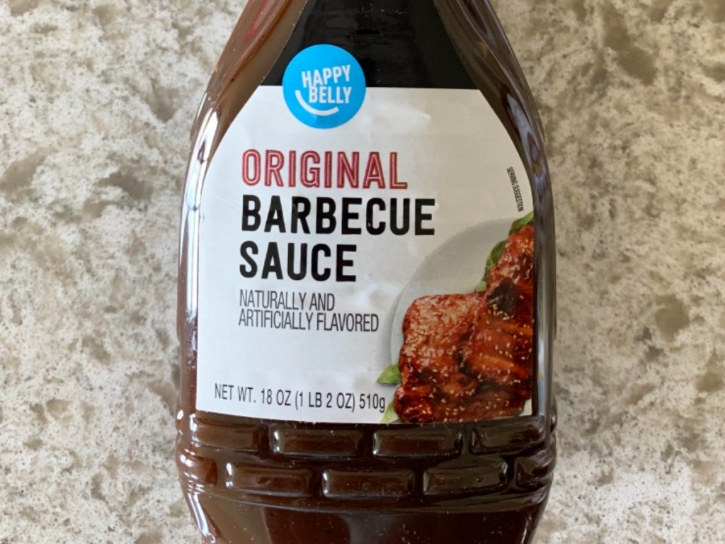 bottle of Happy Belly BBQ Sauce on kitchen counter