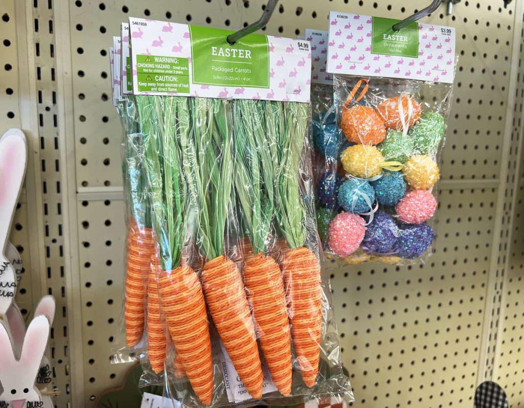 packaged carrots and egg decor on store display