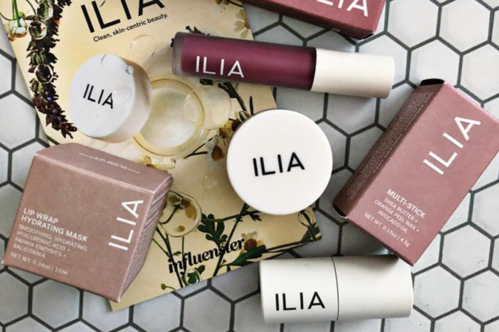 ilia products spread out on the counter