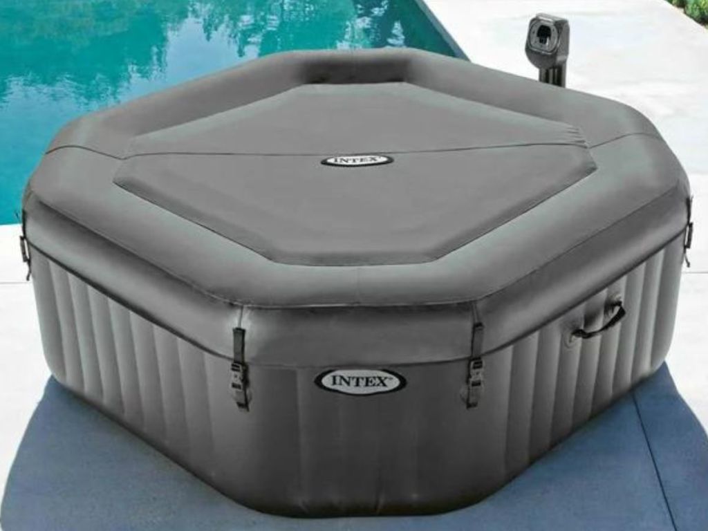 Intex inflatable hot tub with cover on it