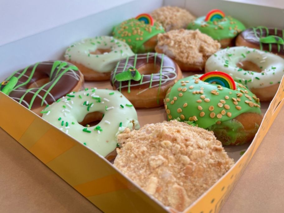 a box filled with a dozen Krispy kreme st patricks day doughnuts
