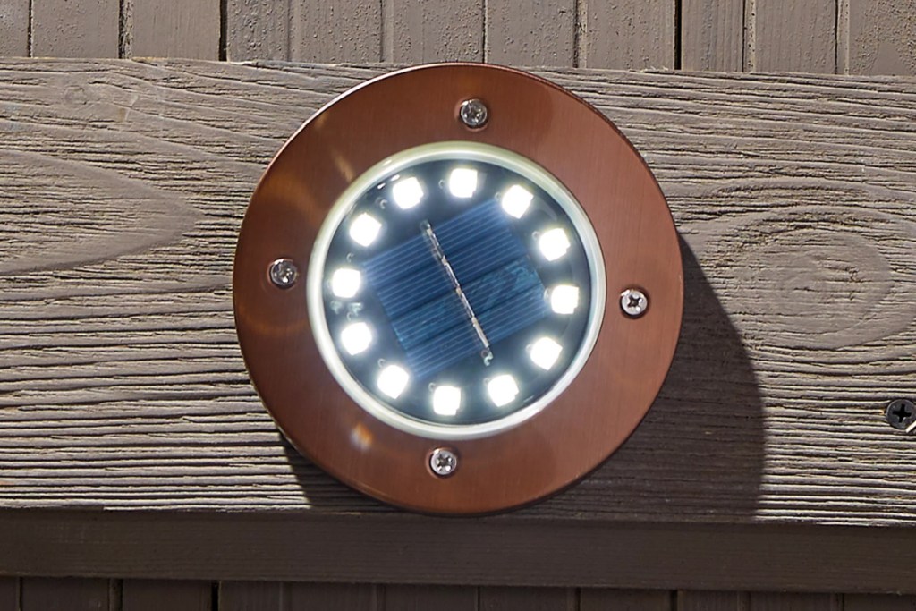 single solar LED disc light in copper