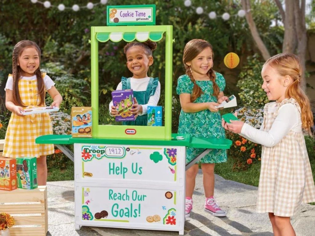 kids playing with girl scout cookie booth