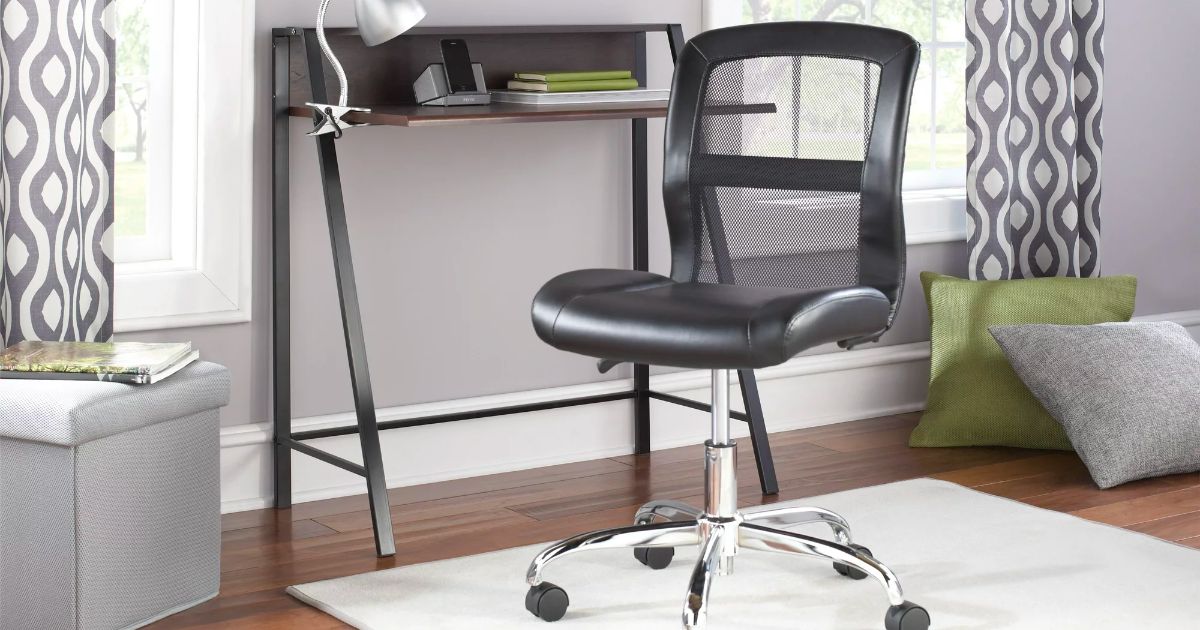A black Mainstays office chair with mesh back