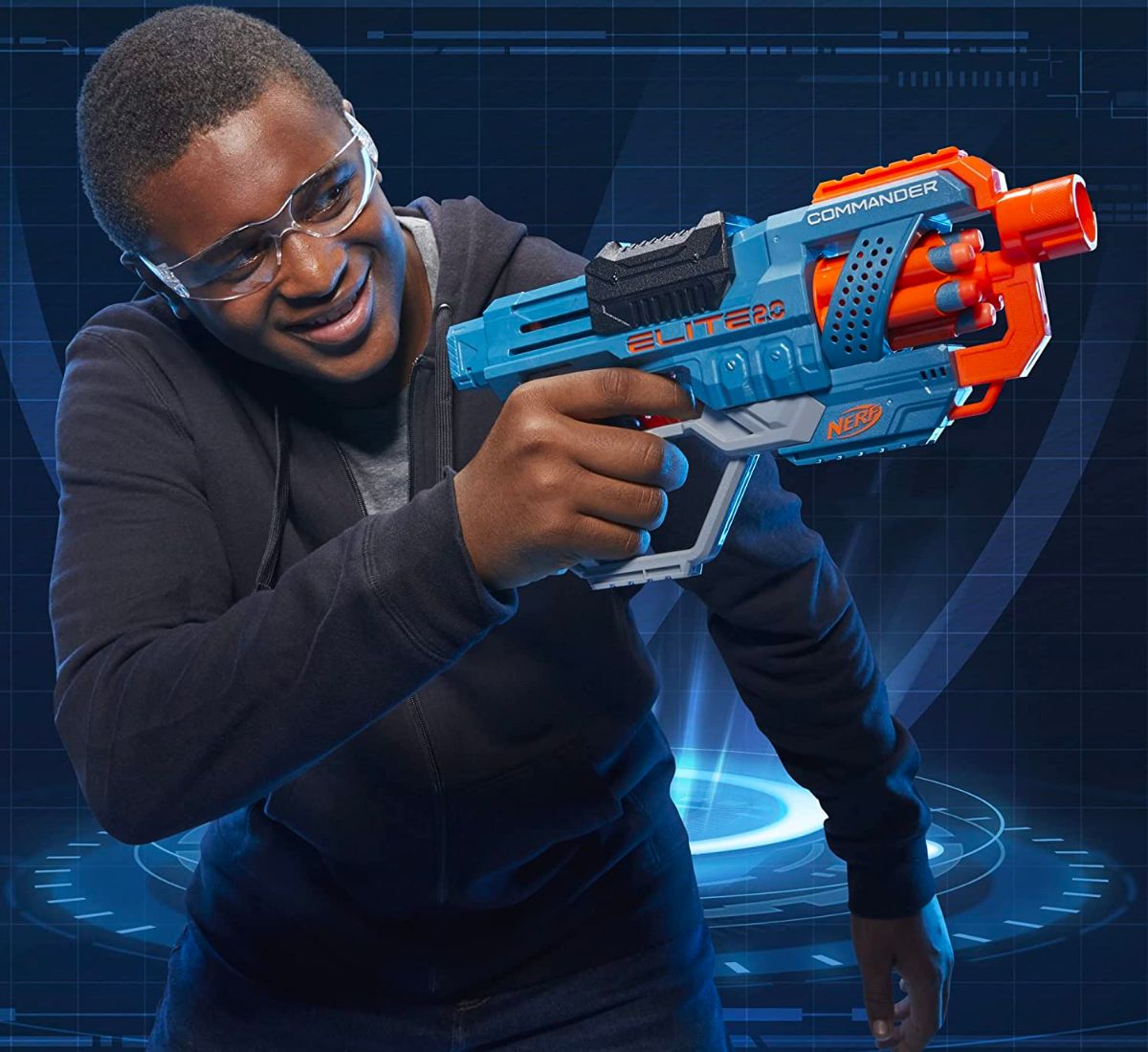 man holding blue NERF Commander Blaster