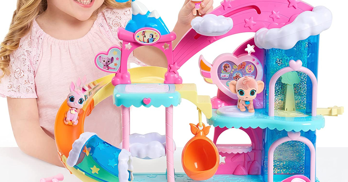 childing playing with a Nursery Headquarters Playset 