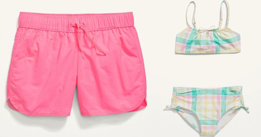 Pink swim shorts and a pastel plaid bikini
