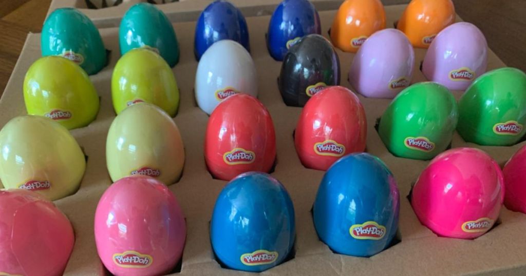 a 24-count pack of Play Doh Plastic dough filled easter eggs in a carton