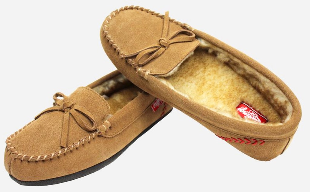pair of moccasins with red baseball stiching near heels