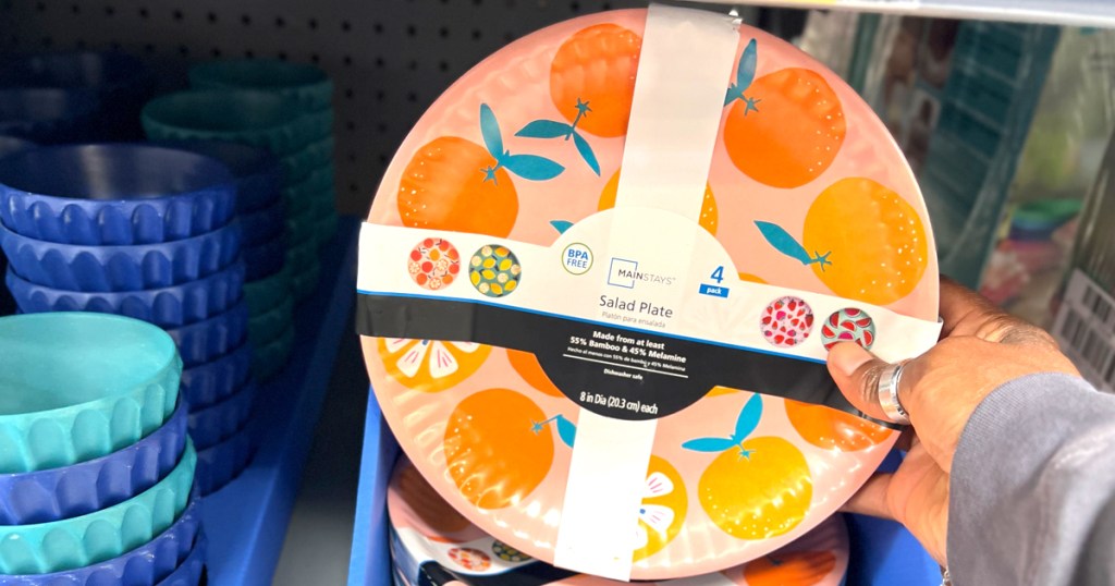 Mainstays Salad Plate Set being picked off the shelf at Walmart