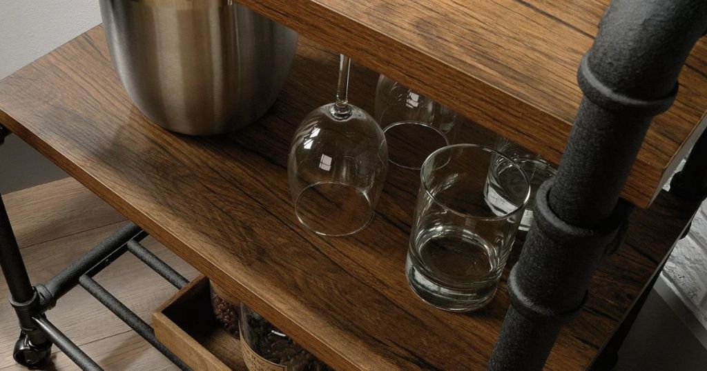 Sauder tolling cart view from top down with wine glasses on middle shelf