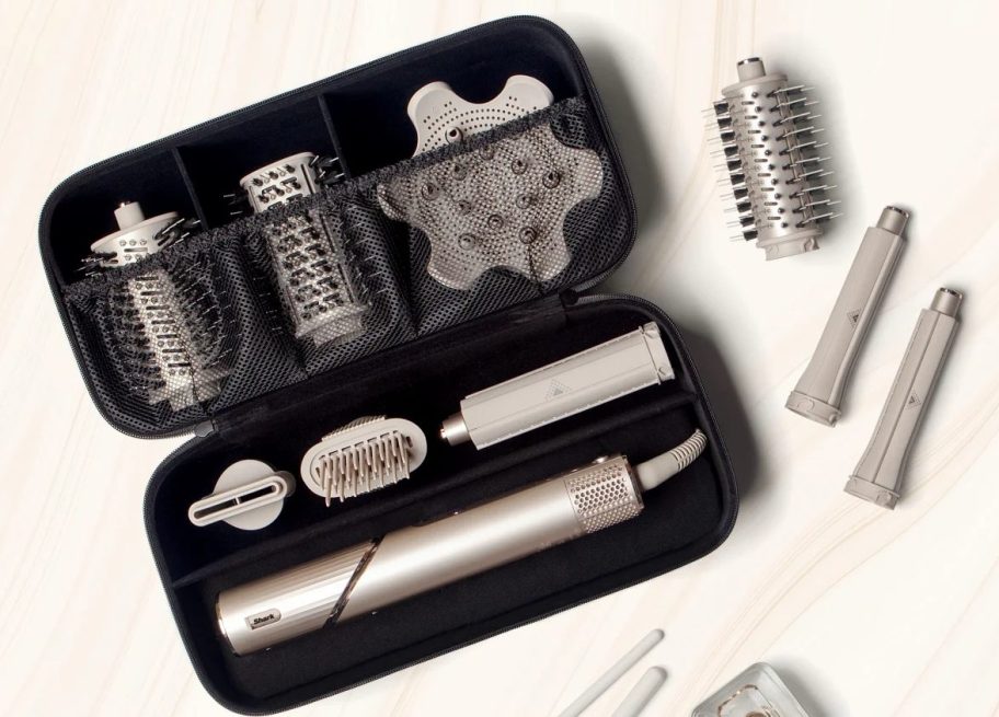 Shark Flexstyle Tools in a black case with makeup brushes next to it