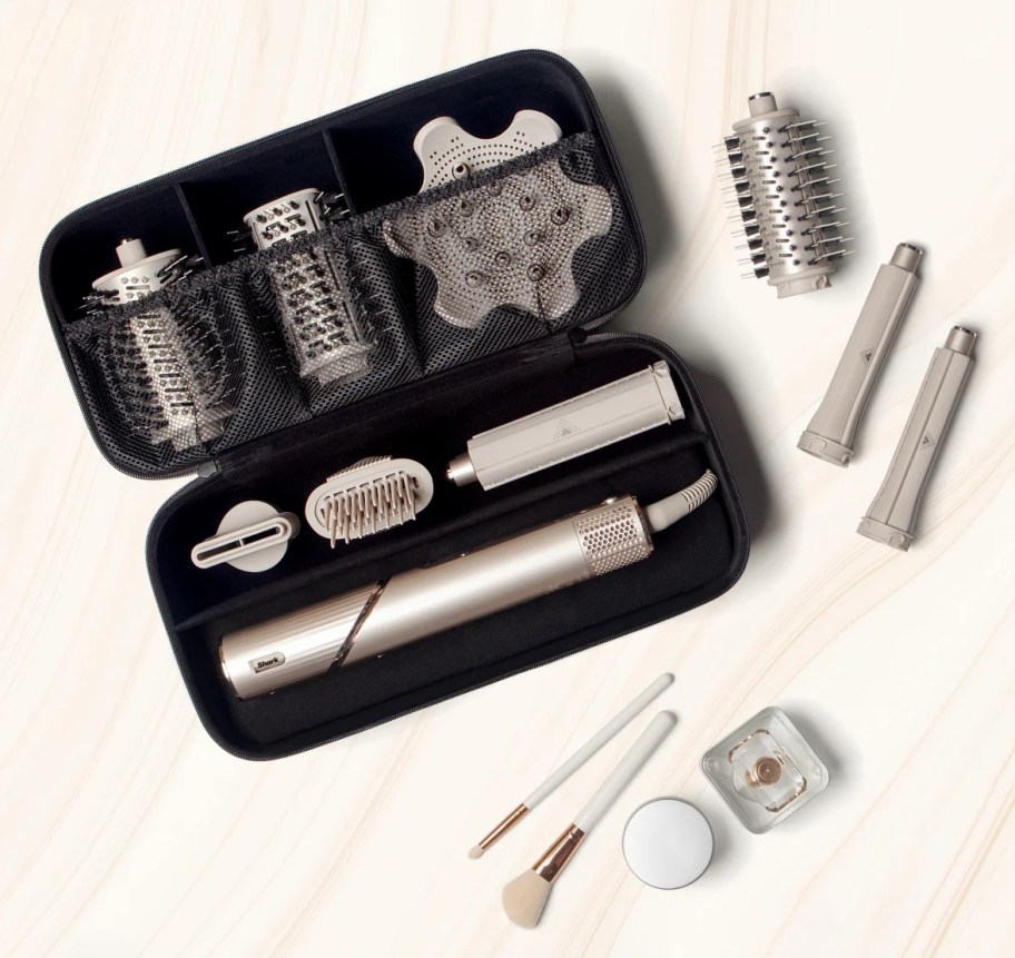 Shark Flexstyle Tools in a black case with makeup brushes next to it