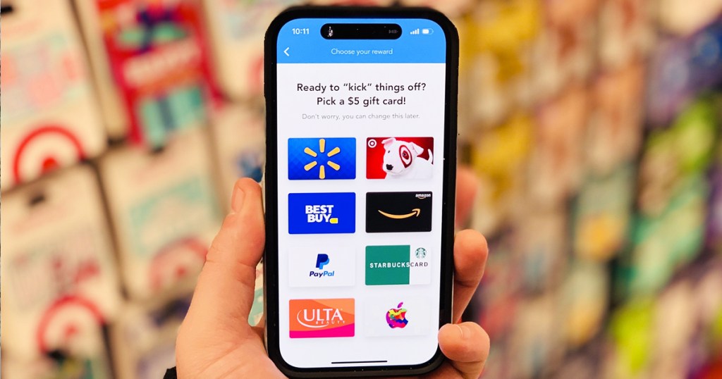 hand holding phone with shopkick app open