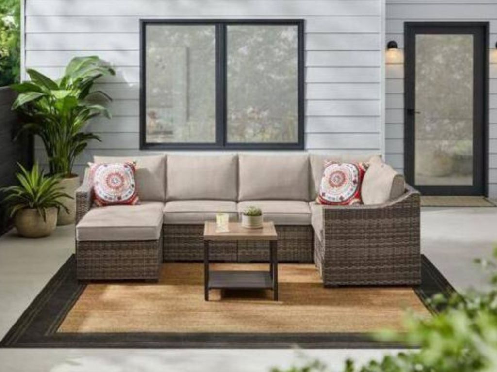 StyleWell Sectional on patio with small table and rug