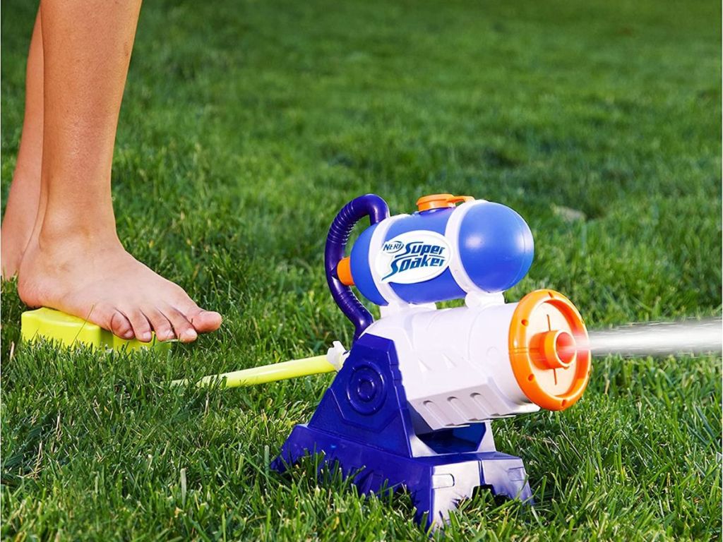foot stepping on the pedal for a Nerf Super Soaker stomp cannon