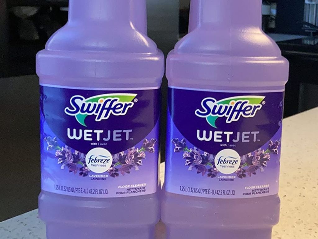 two Swiffer Wet jet Refill on a counter top