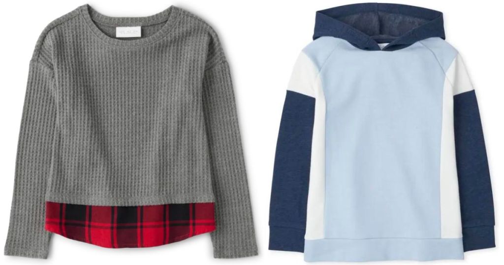 gray sweater with plaid under shirt and blue block sweatshirt