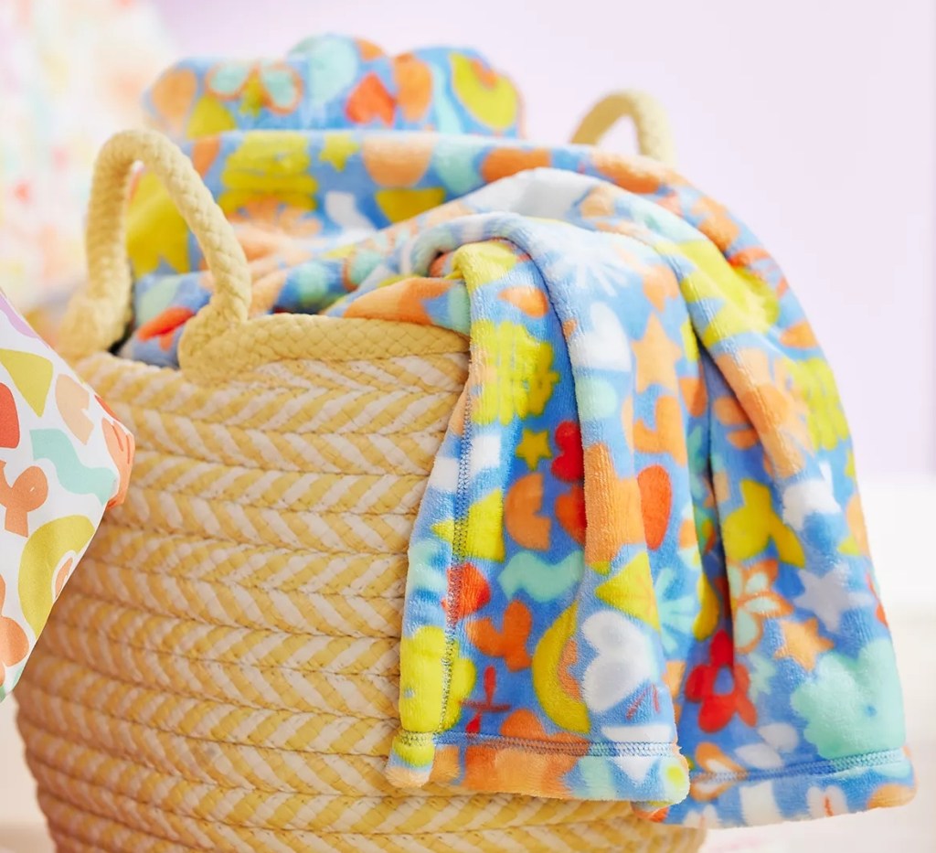 Colorful throw blanket in a basket