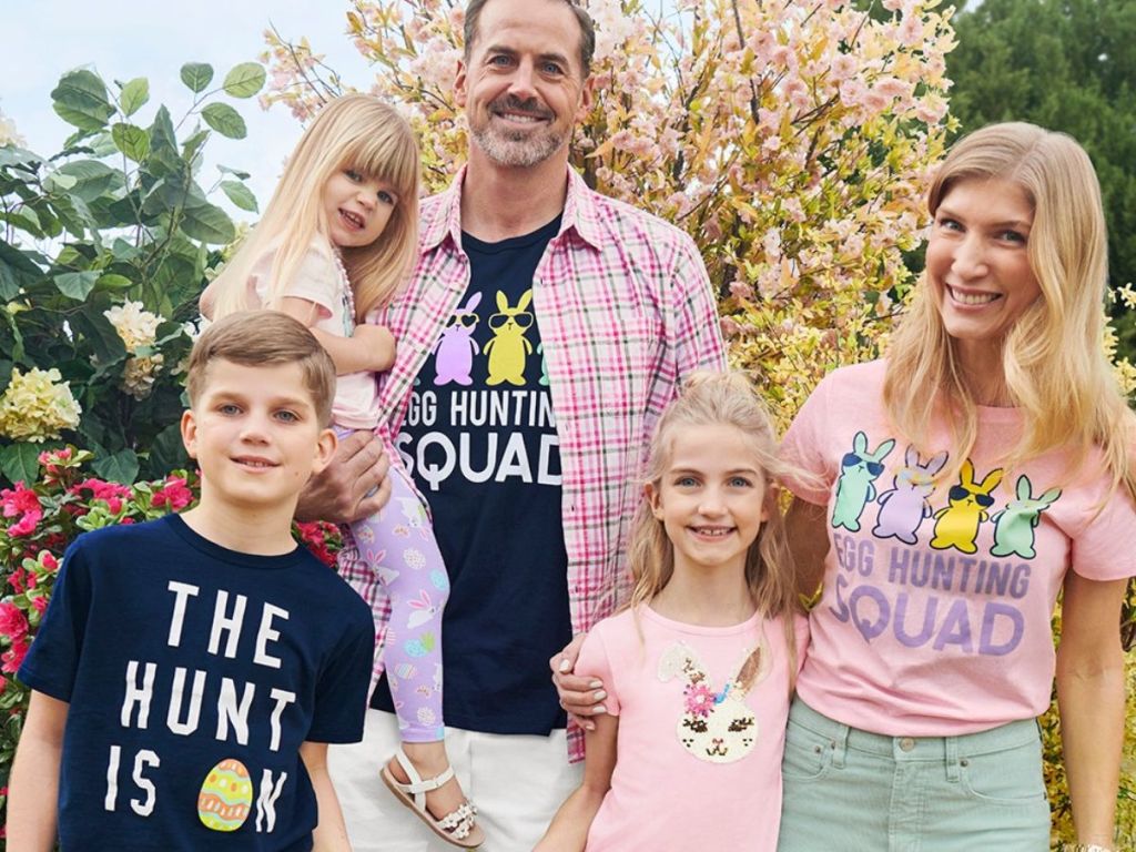 a family with 3 children wearing The Children's Place matching family Easter graphic tees