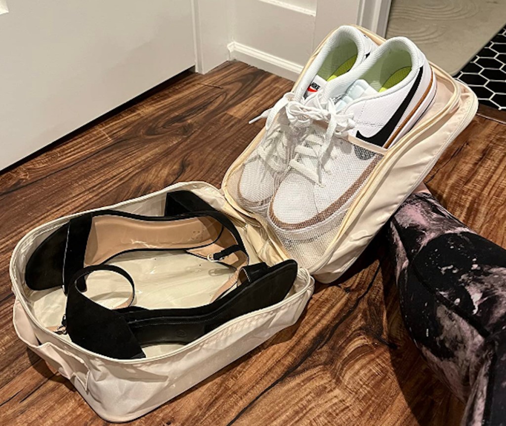 shoe bag organizer travel products on wood floor with nikes and black heels inside