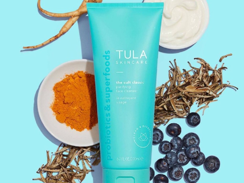 Tula cleanser with spices, berries and yogurt in the background