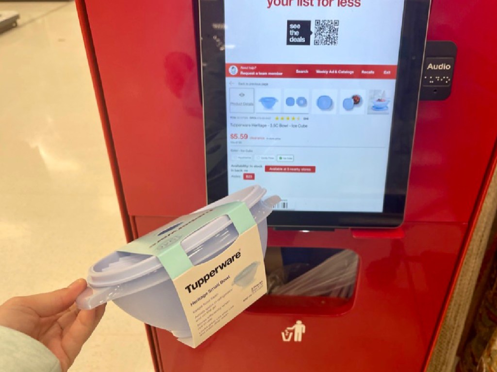 Tupperware in woman's hand being scanned at target