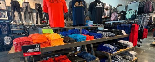 In-store display of under armour t-shirts for men