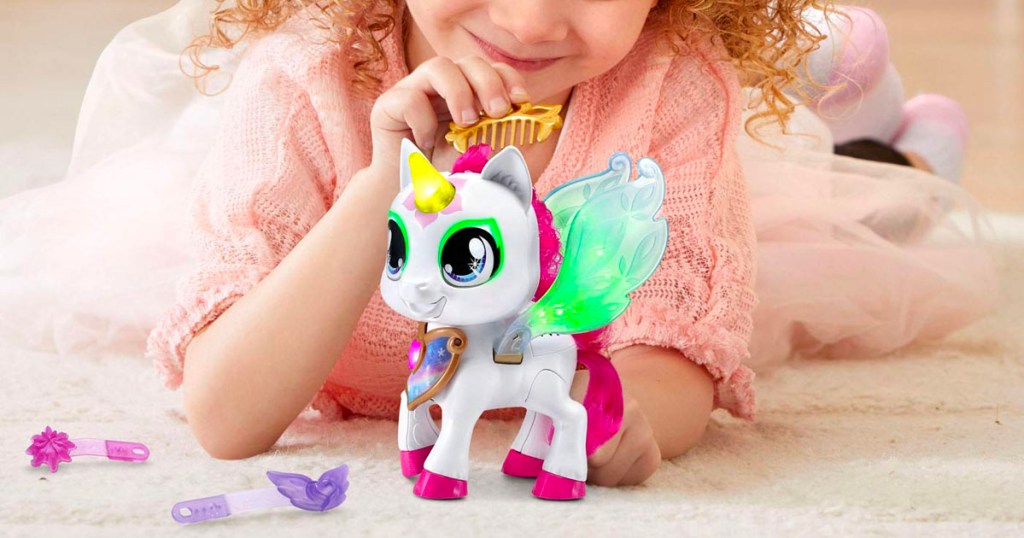 little girl brushing vtech sparkling mia unicorn toys hair 