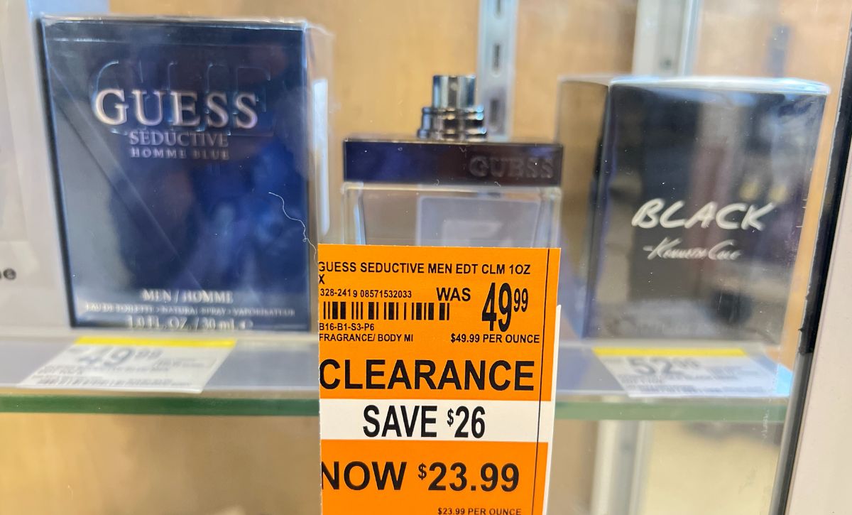 Guess men's cologne in-store in a glass case on clearance