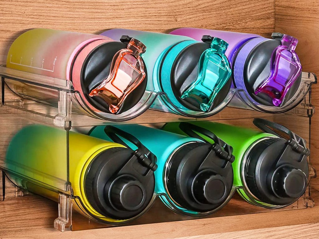 6 water bottles in clear organizer inside cabinet
