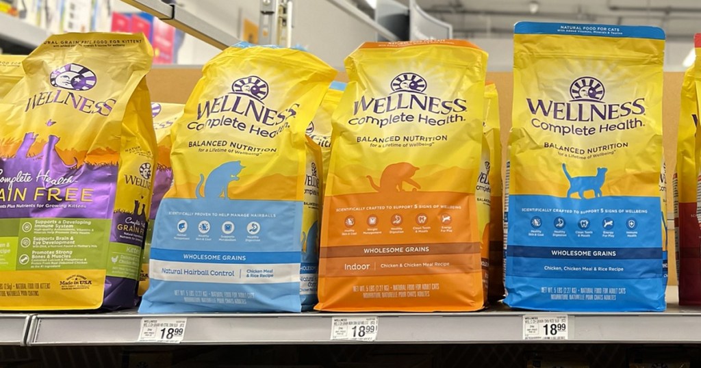 bags of Wellness Complete Health Dry Cat Food on store shelf