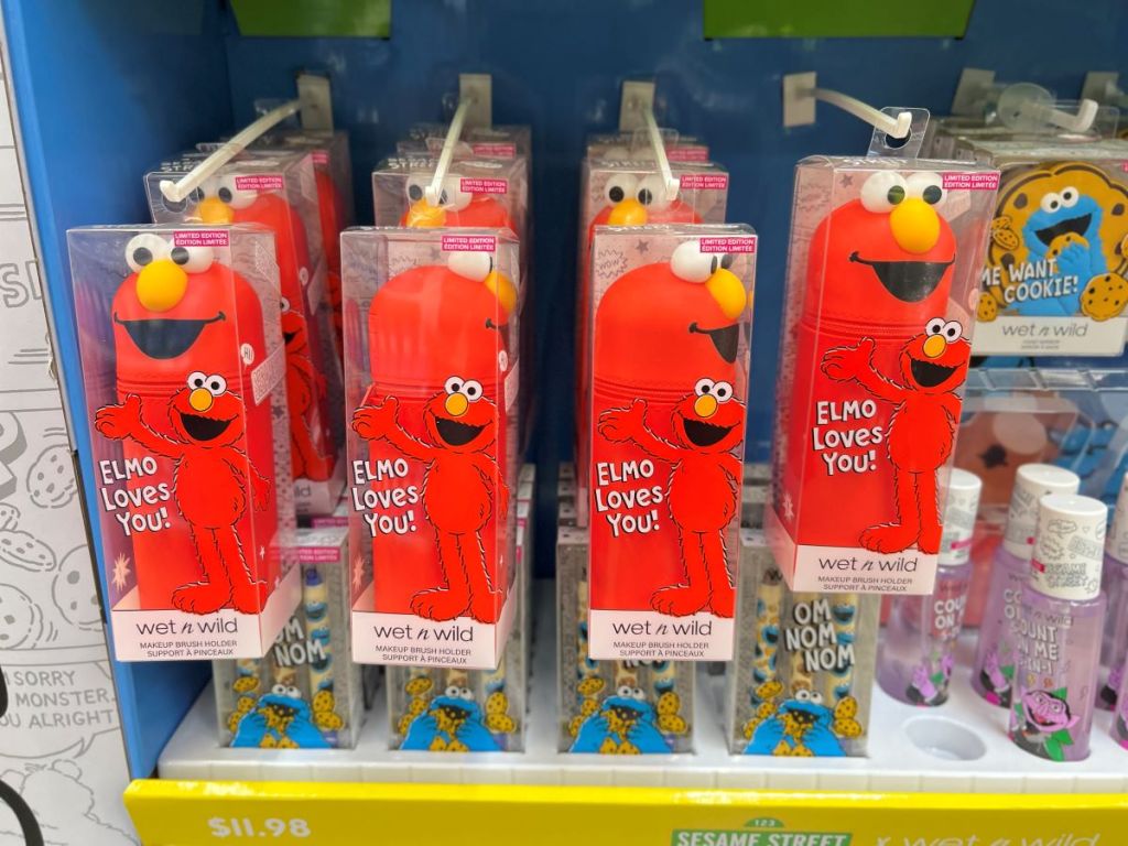 Display of Elmo themed makeup brush holders at a store