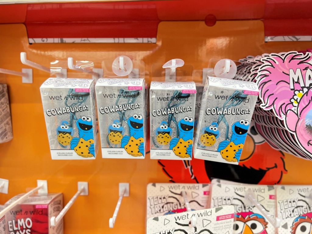 Display of Cookie Monster themed eye curlers at a store