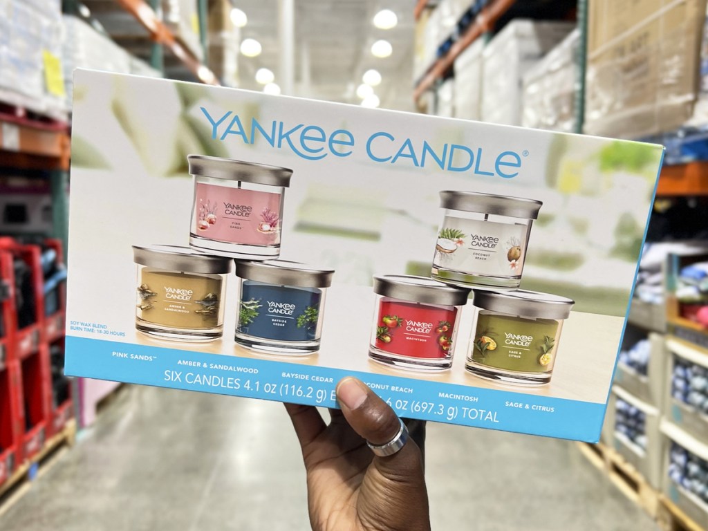 hand holding a box for a yankee candle gift set