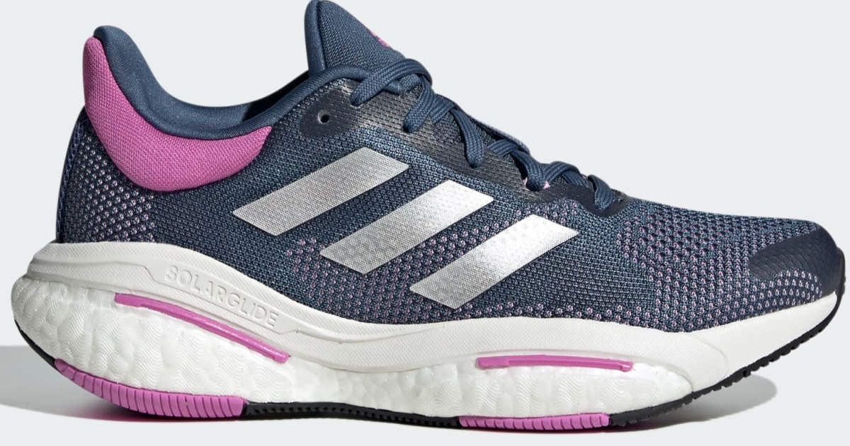 One adidas solar glide shoe. The side view. It is gray, silver and lilac.