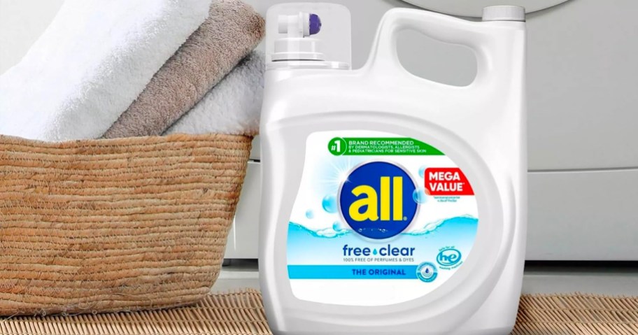 all free clear laundry detergent next to washer