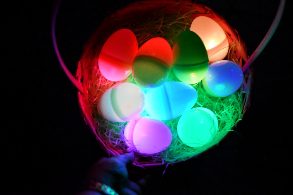 basket of glow in the dark plastic easter eggs