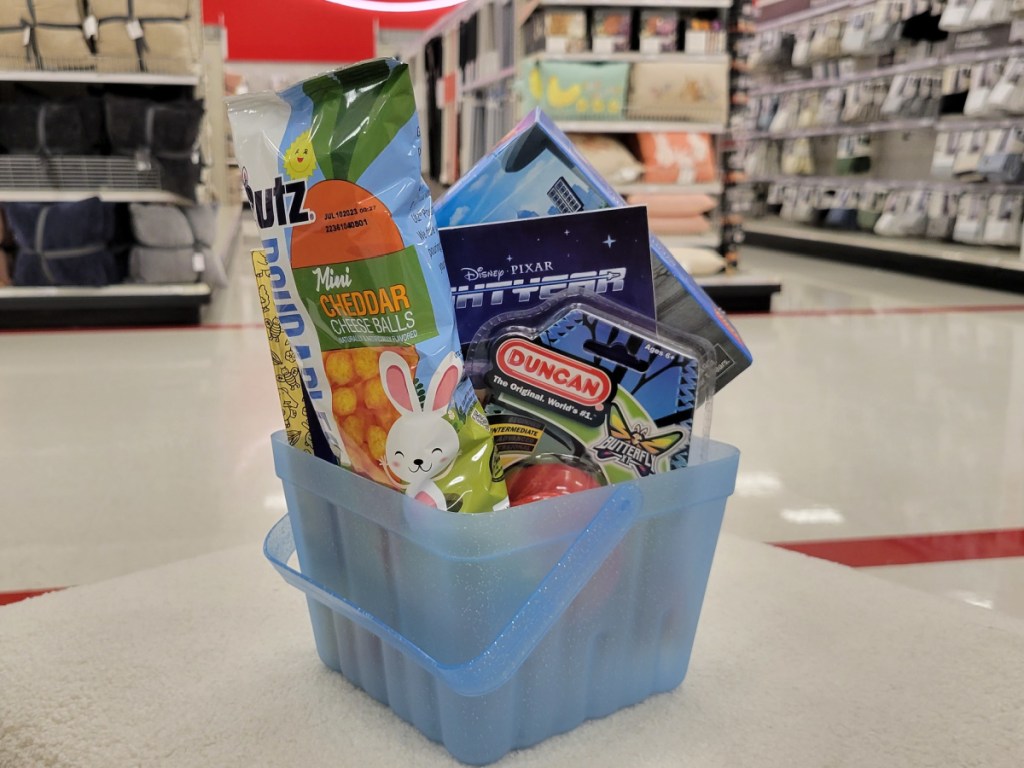 blue Easter Basket filled with snacks and treats at the store