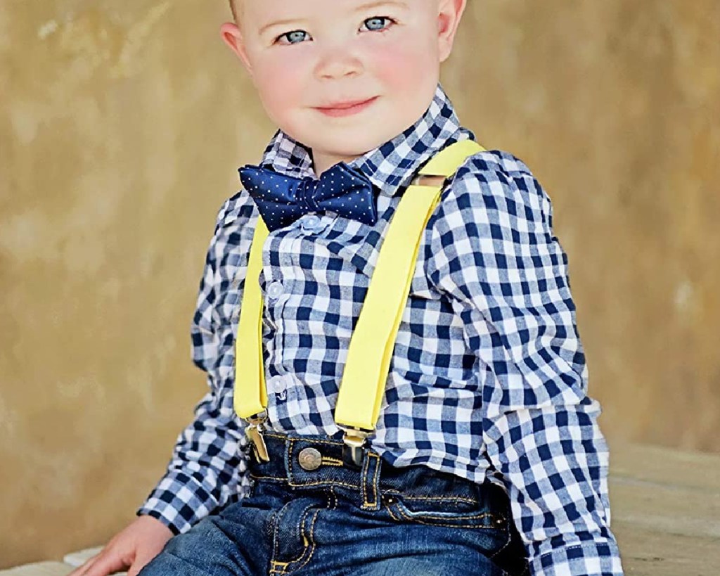 boy in yellow suspenders
